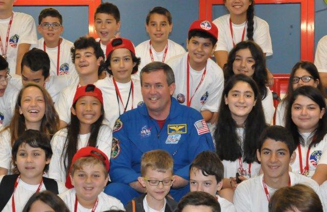 ASTRONAUT FOREMAN ADDRESSES STUDENTS: “NEVER GIVE UP”